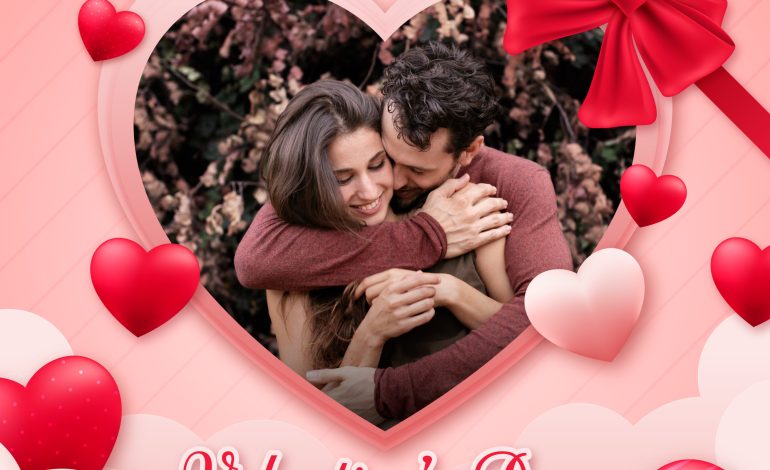 Romantic couple embracing inside a heart frame with Valentine's Day decorations.